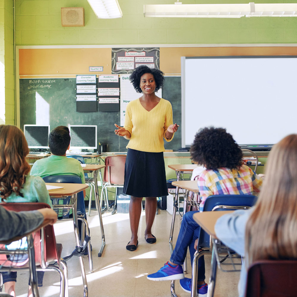 Teacher instructing students in classroom