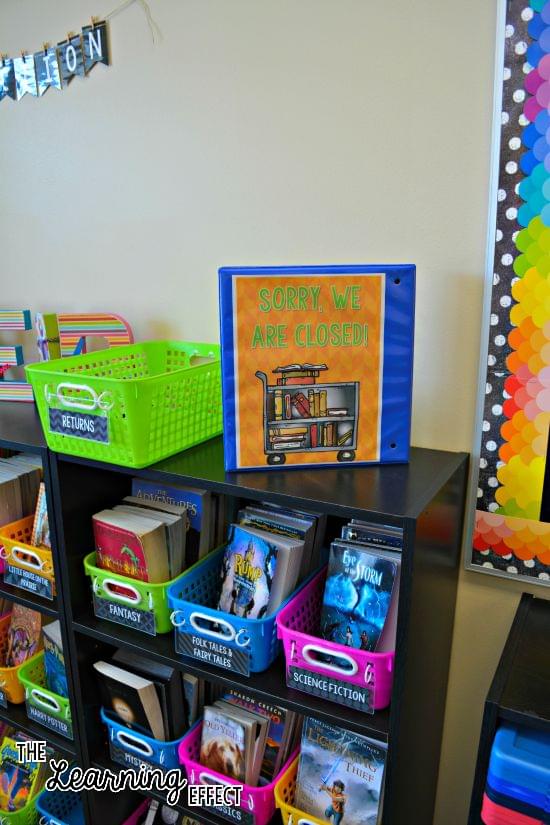 Bright classroom library with rainbow chalkboard theme