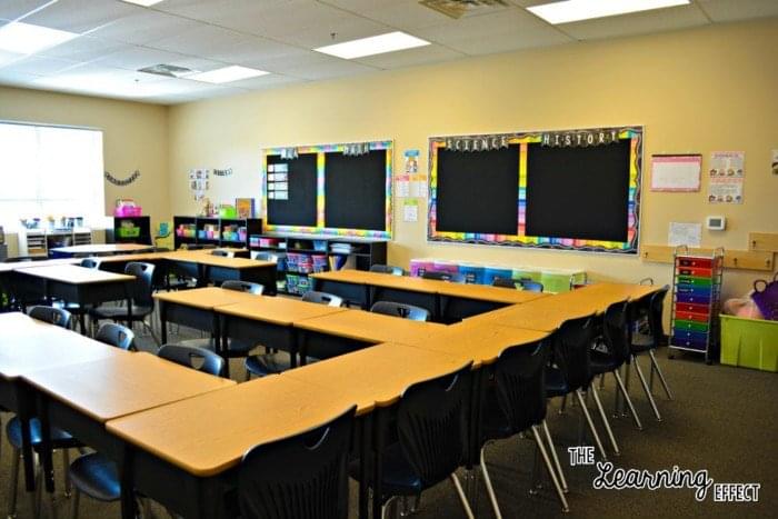 Bright classroom with rainbow chalkboard theme