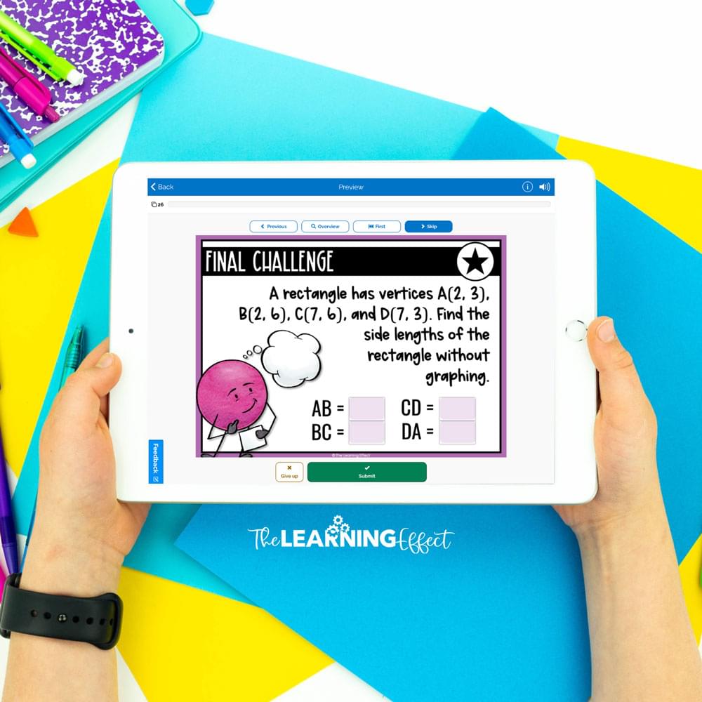Student holding ipad with boom card activity